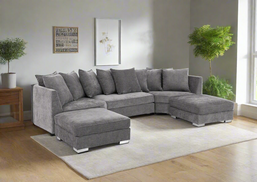 Modern gray L-shaped sectional sofa with plush cushions and two matching ottomans, perfect for a cozy and stylish living room. Upholstered in soft, durable fabric, this spacious sofa offers ultimate comfort and contemporary design. Ideal for relaxing, entertaining, or lounging in style.