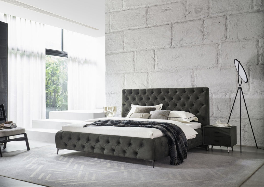 Royal bedframe in Green angled view in a room setting from the right with bedside unit