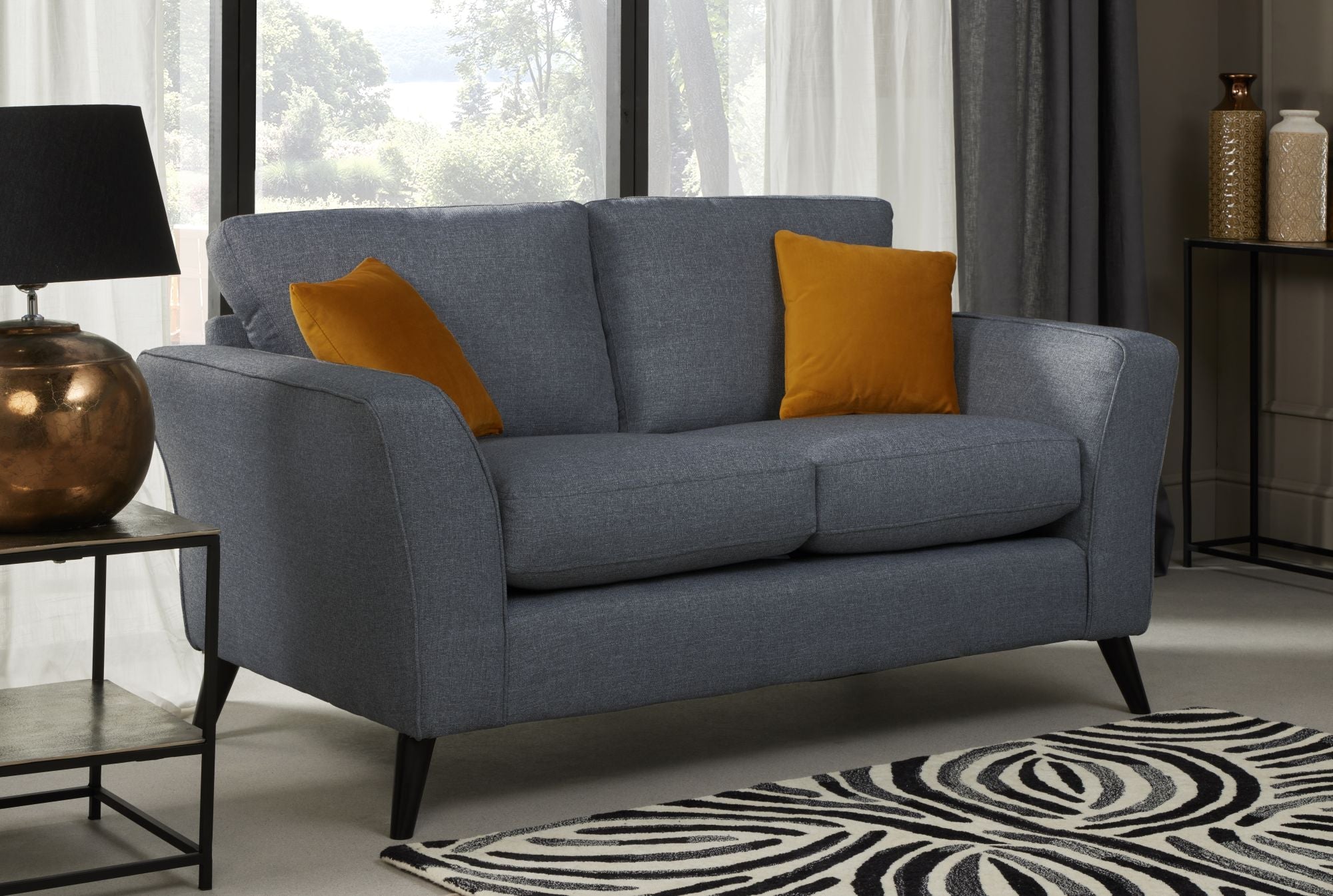 Libby 2 seater sofa in denim shown as room set up