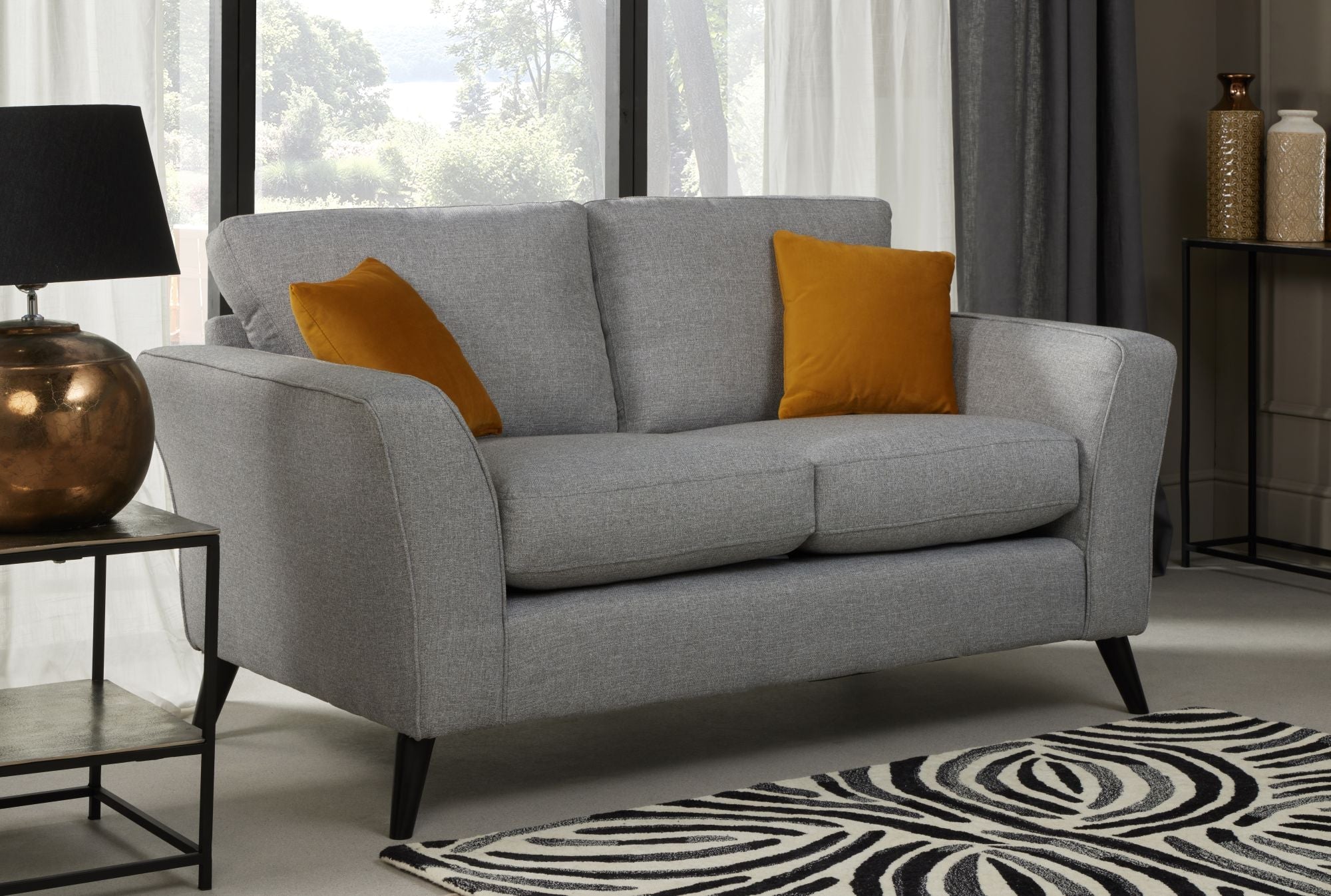 libby 2 seater sofa in silver shown in a room setting