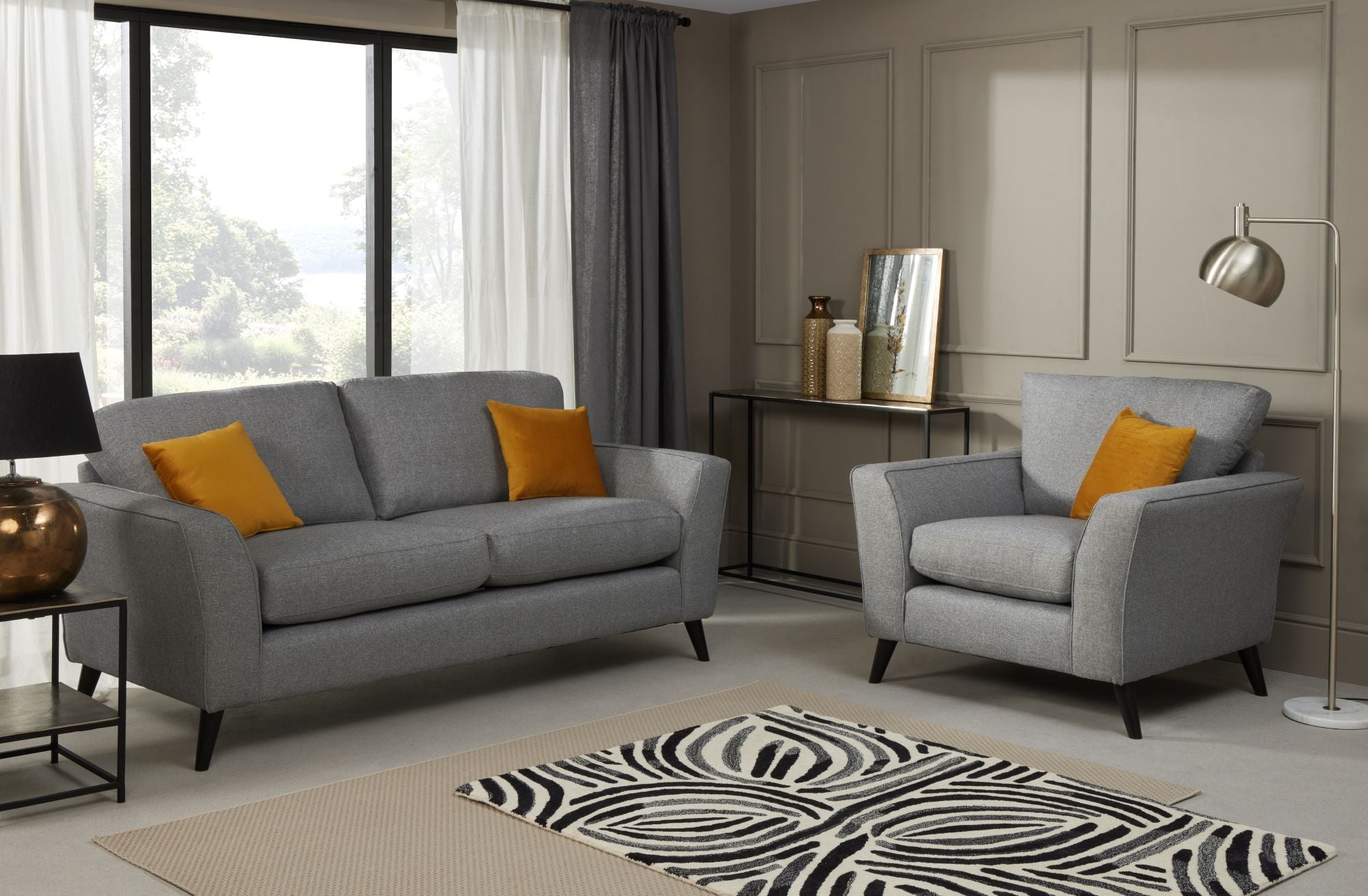 Libby 3 seater and armchair in charcoal shown in a room setting