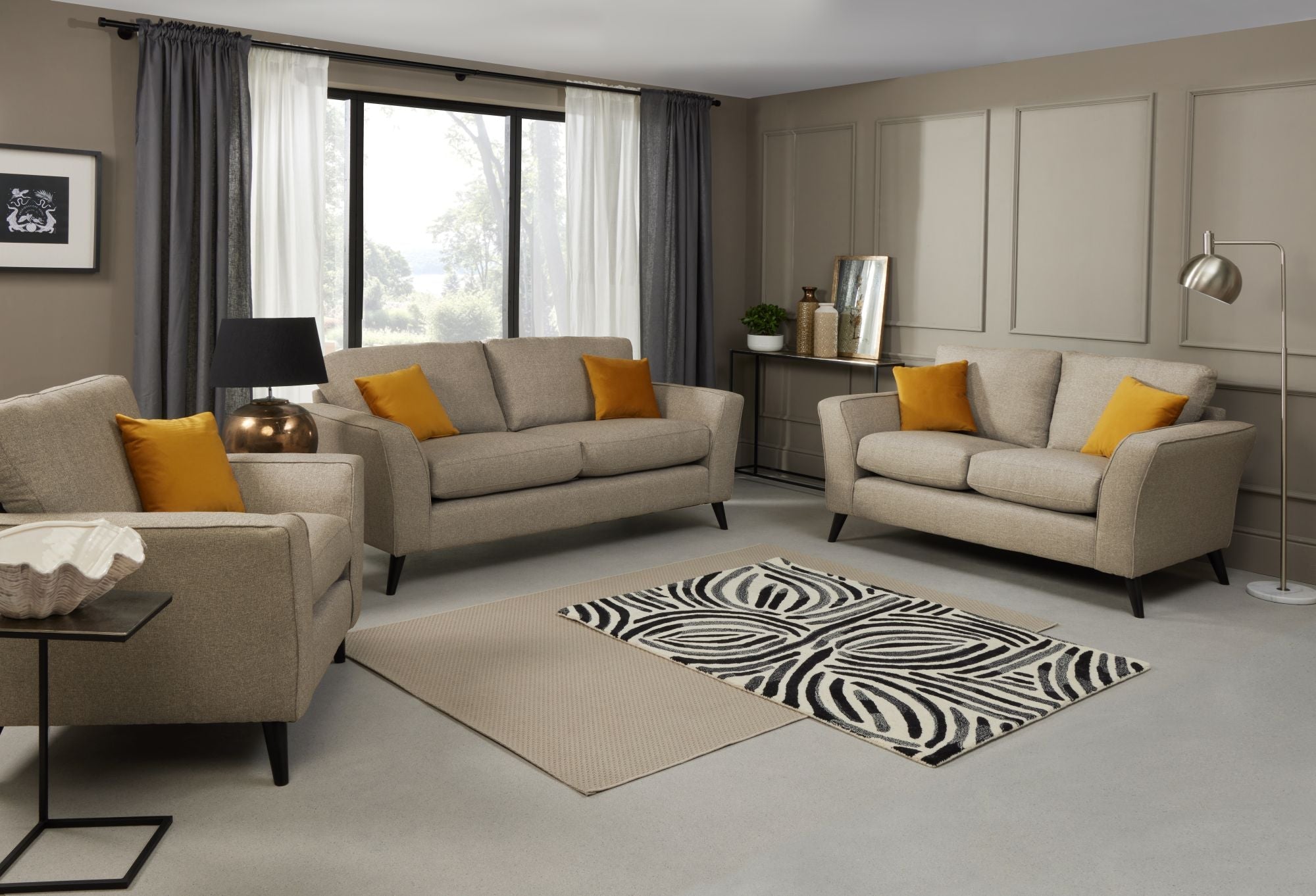 Libby 2 seater, 3 seater and armchair in Oatmeal shown in a room setting