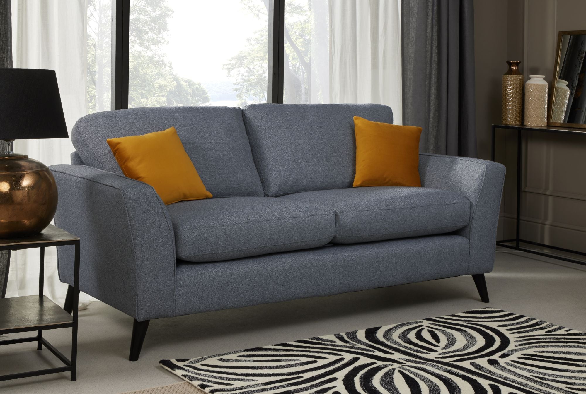 Libby 3 seater in denim shown in a room setting