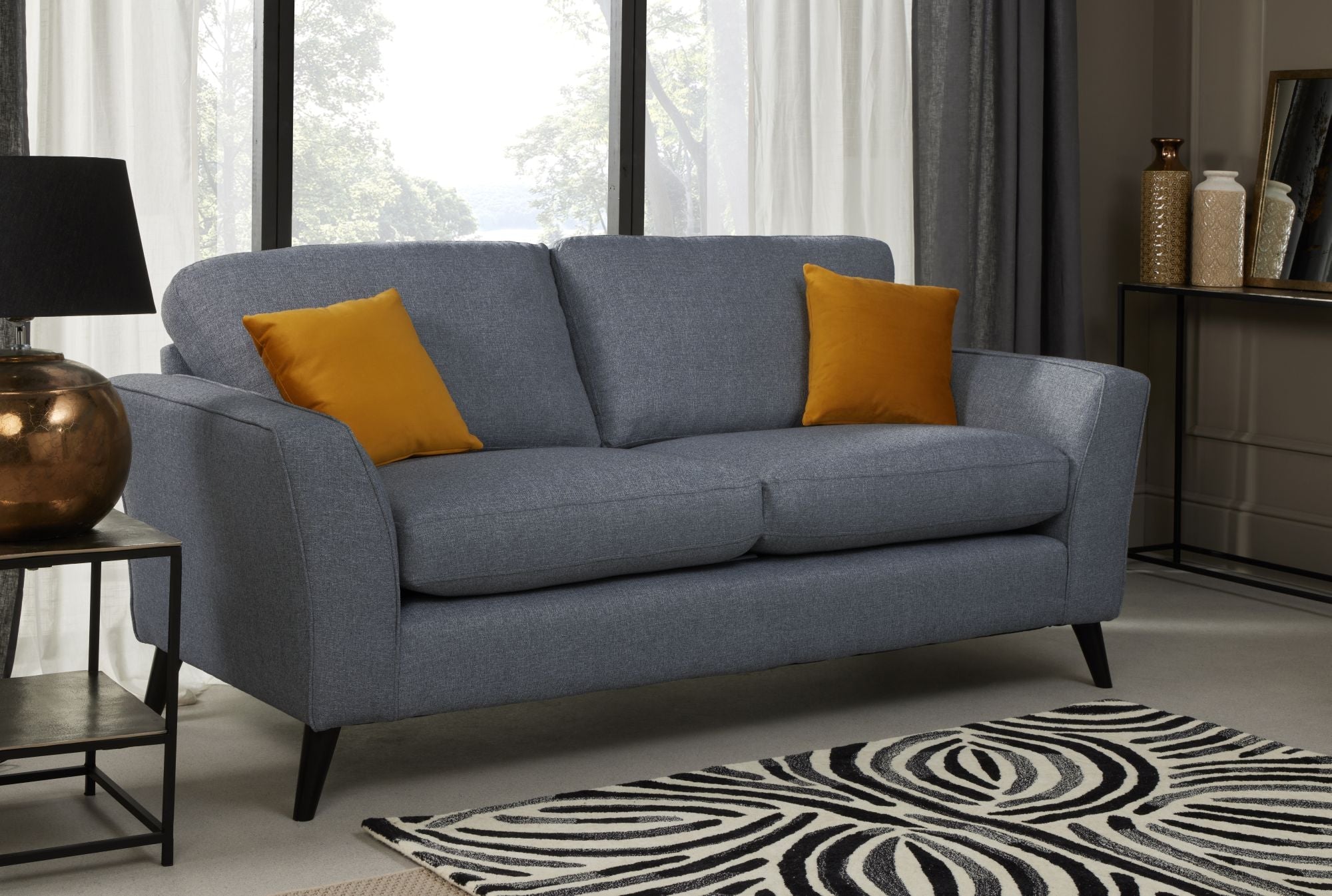 Libby 3 seater in denim shown in a room setting