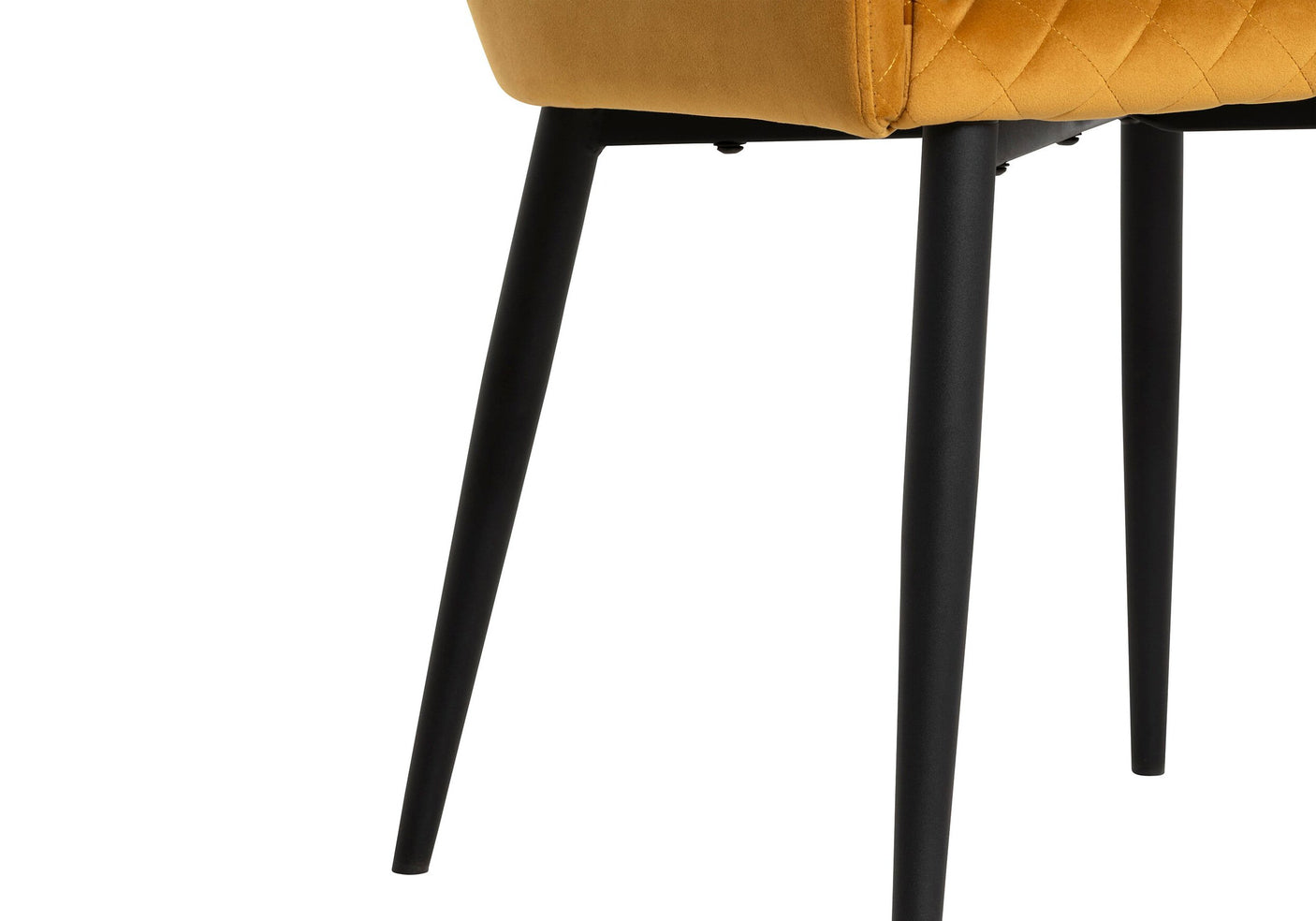 Close-up of a mustard yellow chair with black legs on a white background