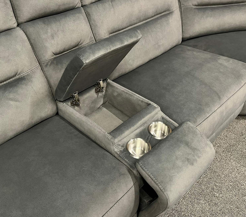 Grey recliner sofa with a built-in cup holder and storage compartment.