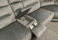 Grey recliner sofa with a built-in cup holder and storage compartment.