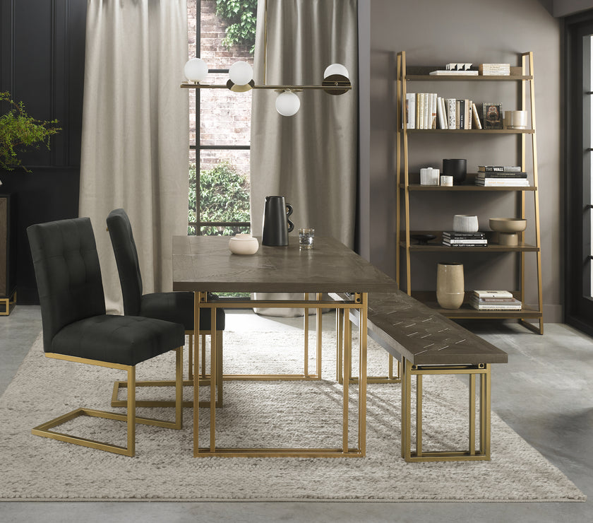 Image of the Lindos Fabric Dining Chairs with black square-stitched upholstery and brass legs styled with some of NCF's other Dining Furniture.