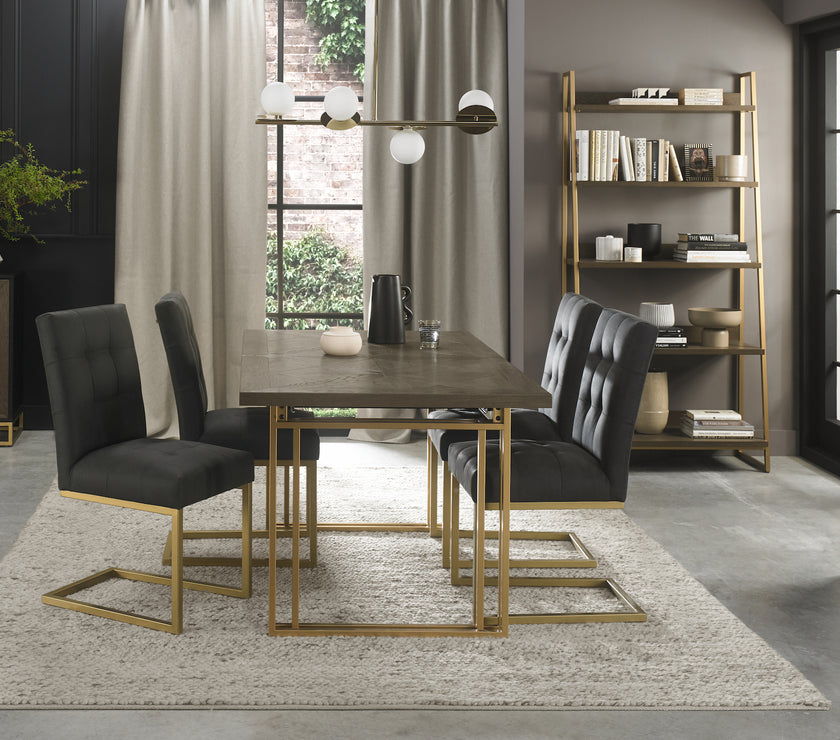 Image of the Lindos Fabric Dining Chairs with black square-stitched upholstery and brass legs styled with some of NCF's Dining Furniture.