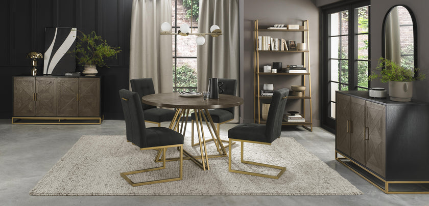 Image of the Lindos Fabric Dining Chairs with black square-stitched upholstery and brass legs styled with some of NCF's Dining Furniture.