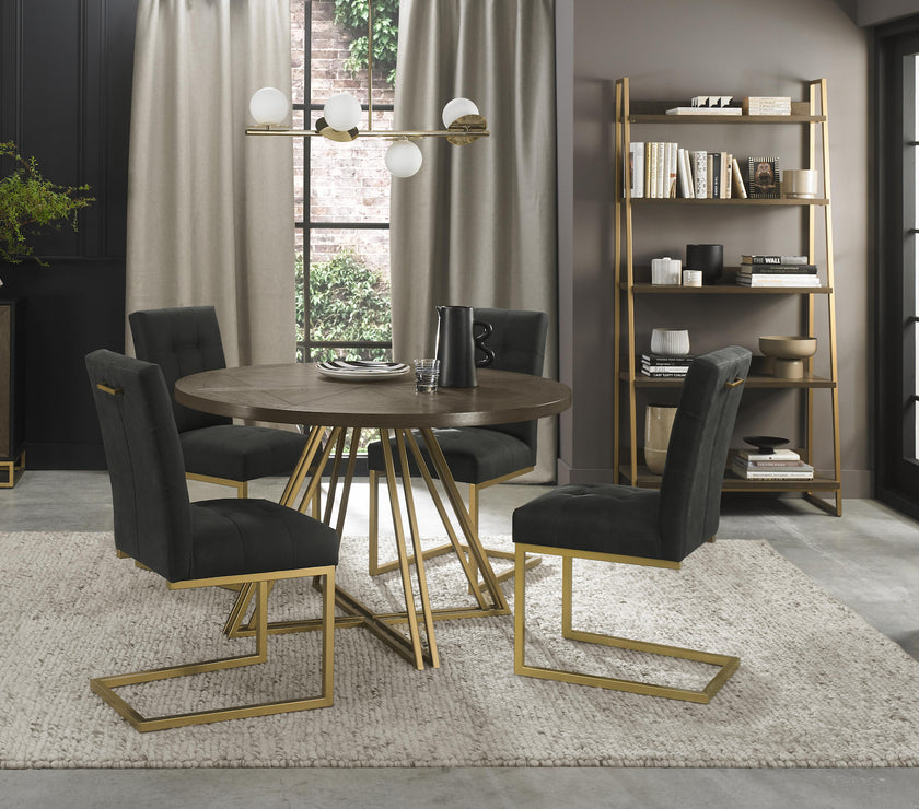 Image of the Lindos Fabric Dining Chairs with black square-stitched upholstery and brass legs styled with some of NCF's Dining Furniture.