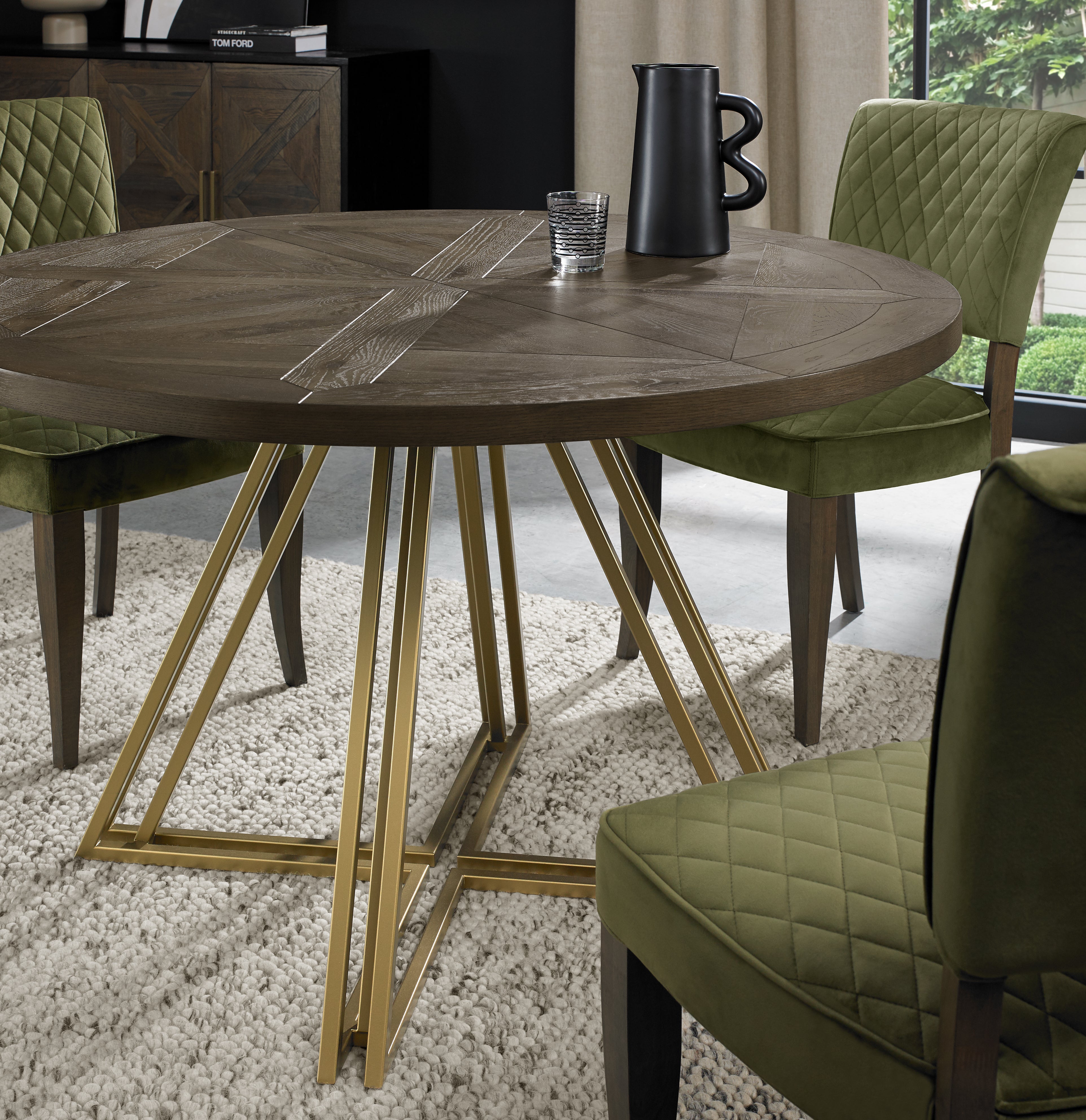 Image of the Lindos Round Dining Table being styled with NCF's Dining Chairs.