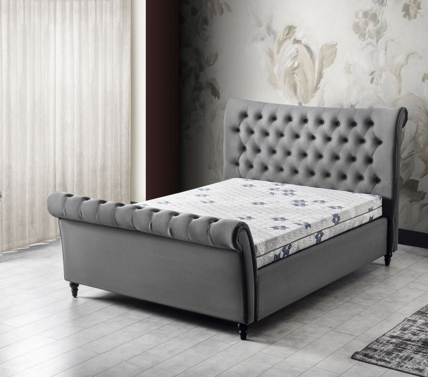 Angled view of the St Tropez Double Size Ottoman Bed Frame in a room