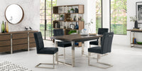 Image of the Toulouse Velvet Dining Chairs with gunmetal fabric, chrome cantilever frame, and quilted button detailing styled with NCF's Dining Furniture.