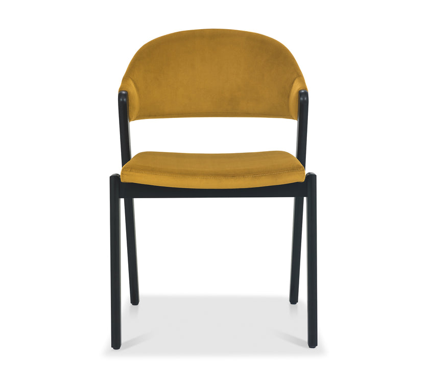 Front image of the Candice Velvet Dining Chair with curved back and dark legs.