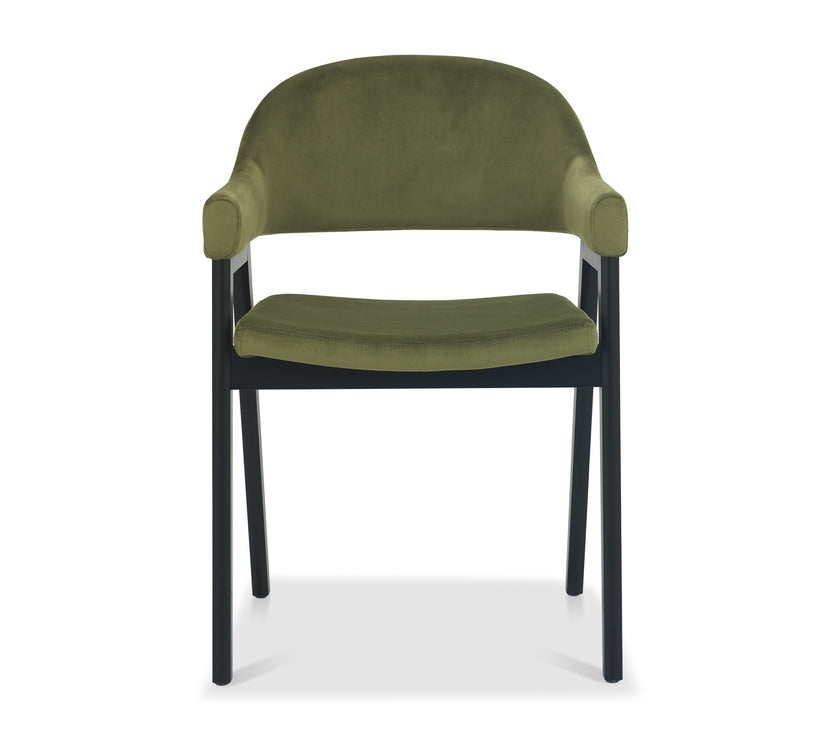 Front image of the Candice Velvet dining chairs with curved back, armrests, and dark legs.