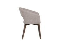 Side image of the Everest Dining Chairs with plush padding and sturdy legs.