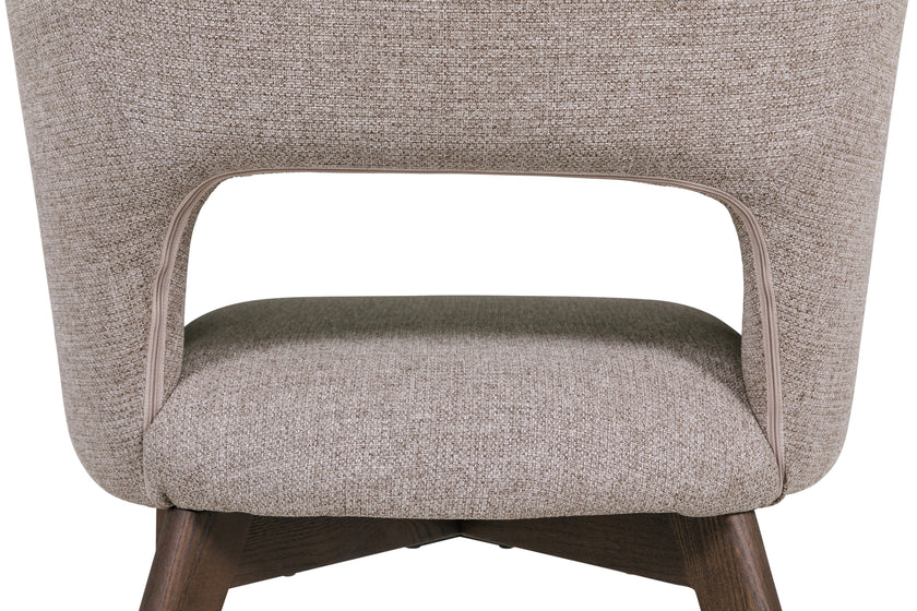 Up close and back view of the Everest Dining Chairs with plush padding and sturdy legs.