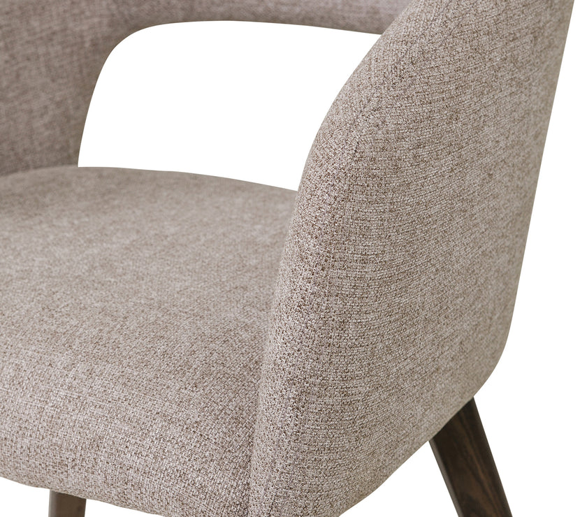 Up close image of the Everest Dining Chairs with plush padding and sturdy legs.