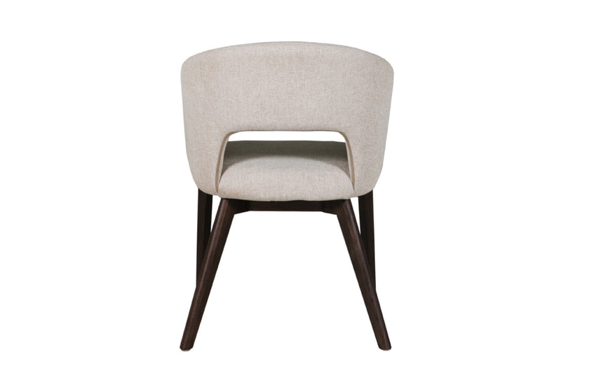 Back image of the Everest Fabric Dining Chairs with plush padding and sturdy legs.