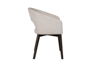 Side view of the Everest Fabric Dining Chairs with plush padding and sturdy legs.