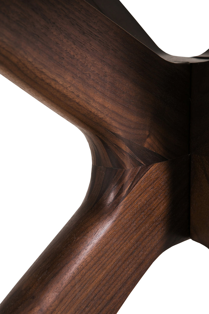 Close up view of the legs of the Everest Dining Table