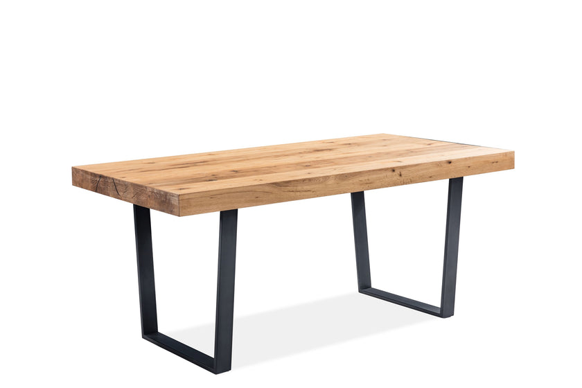 Angled view of the Porto Oak Dining Table