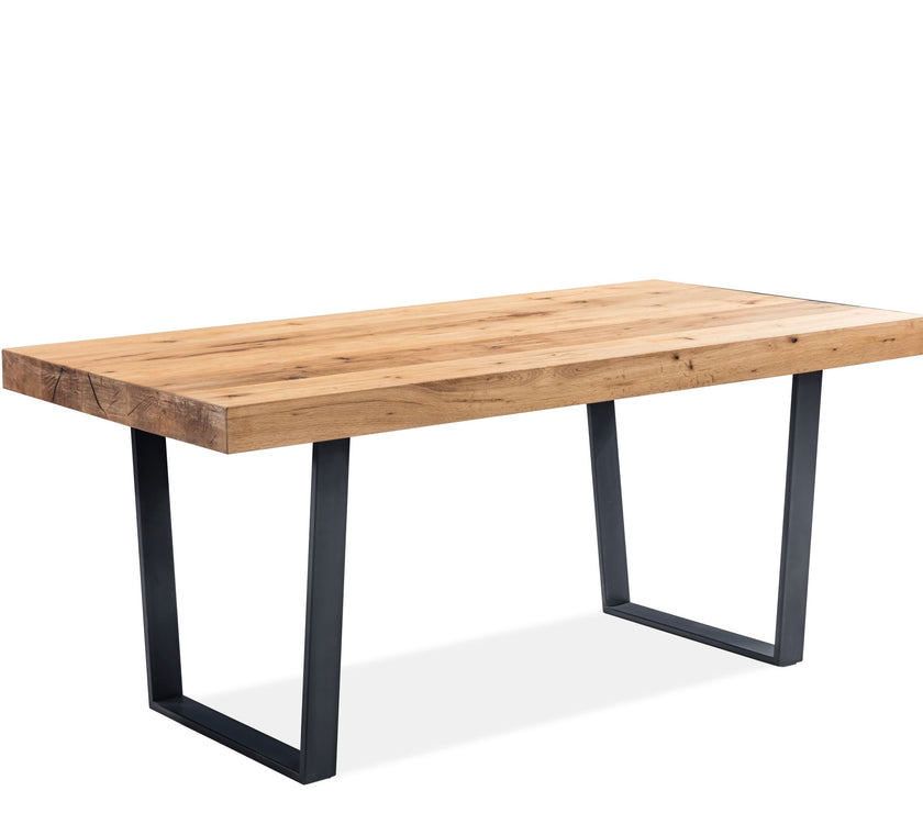 Angled view of the Porto Oak Dining Table