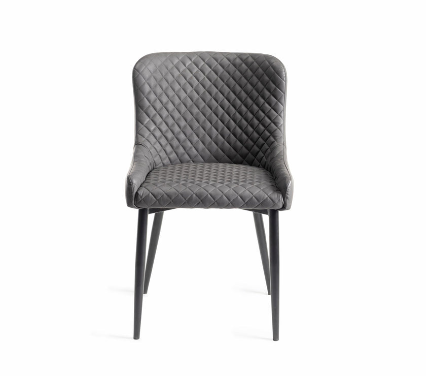 Front view of the Lozanne Faux Leather Dining Chairs with diamond stitching and metal legs.