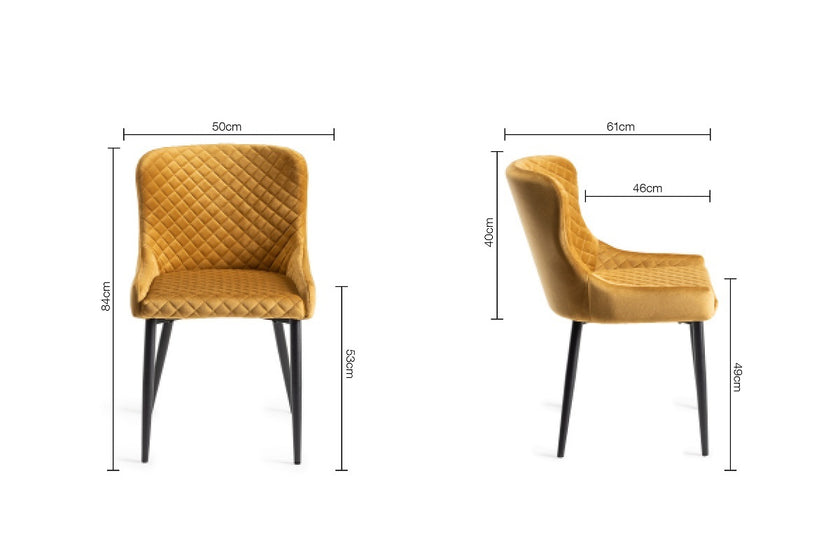 dimensions of our Lozanne Velvet Dining Chair in mustard with diamond stitching and black legs.