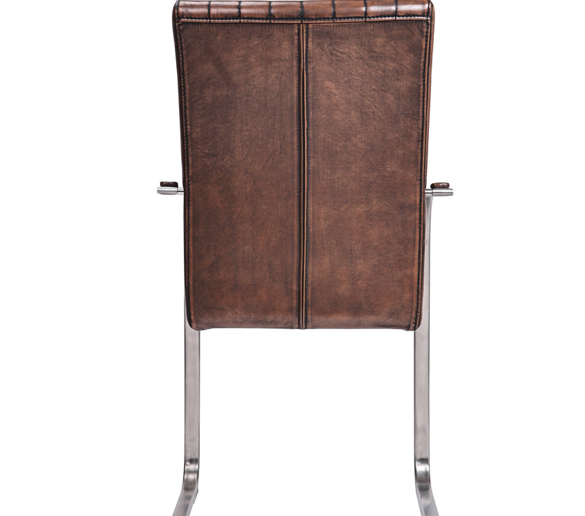 Back view of the Triumph Cantilever Faux Leather Dining Chairs with armrests and steel legs.