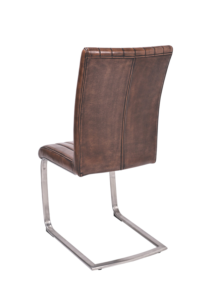 Back and angled image of the Vespa Cantilever Faux Leather Dining Chairs with curved back and steel legs.