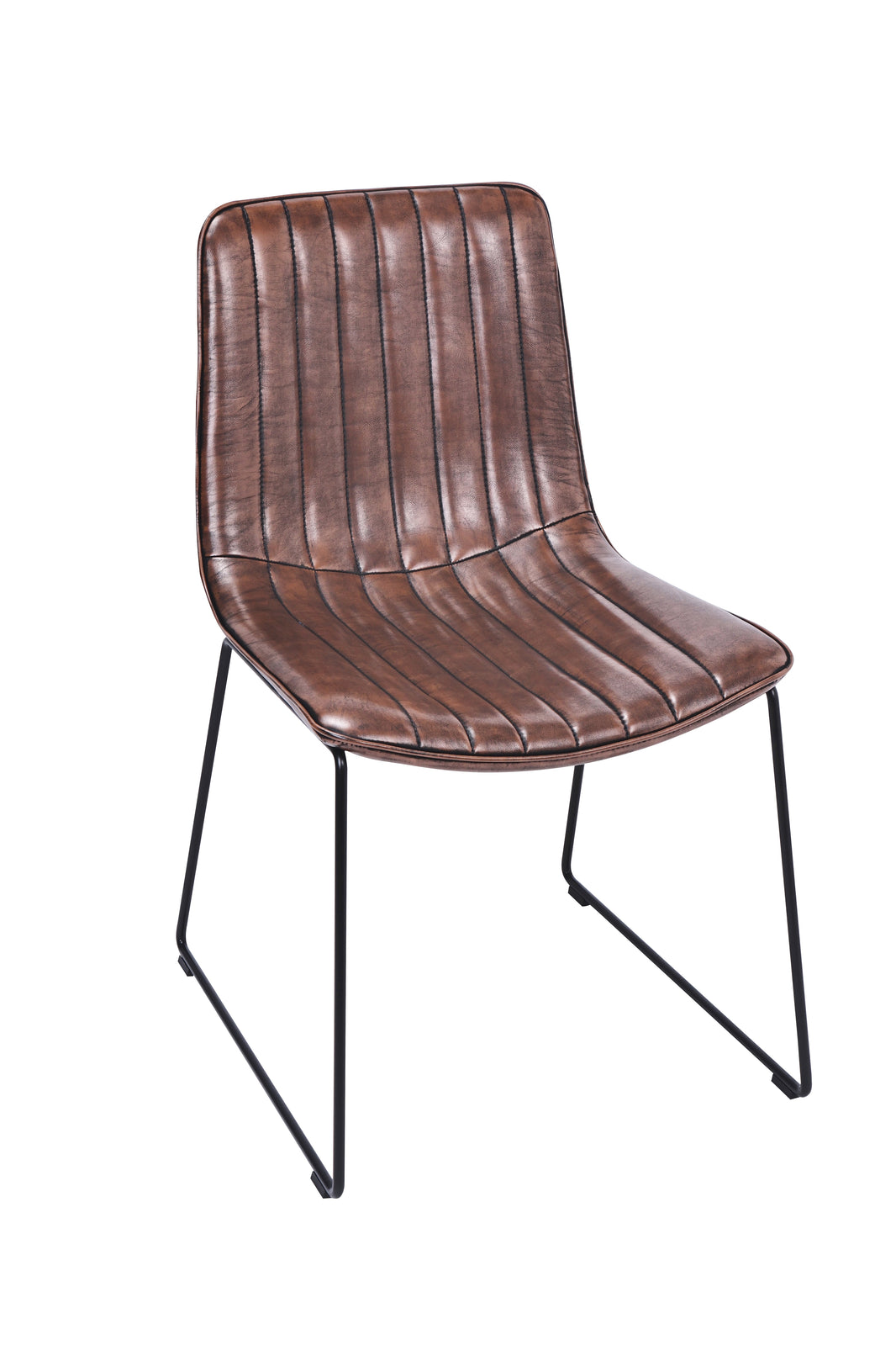 Angled view of the Atlas Faux Leather Dining Chairs with curved back, tan upholstery, and black metal legs.