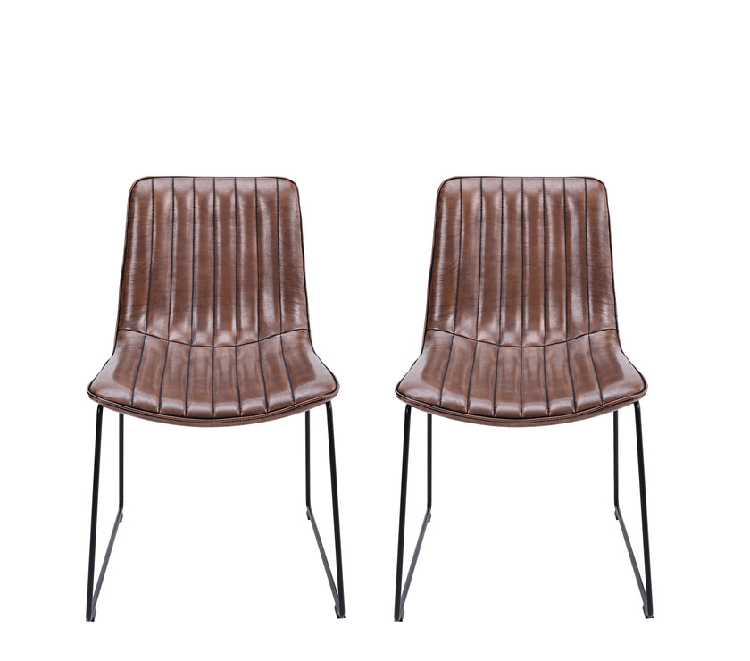 Front view of the Atlas Faux Leather Dining Chairs with curved back, tan upholstery, and black metal legs.