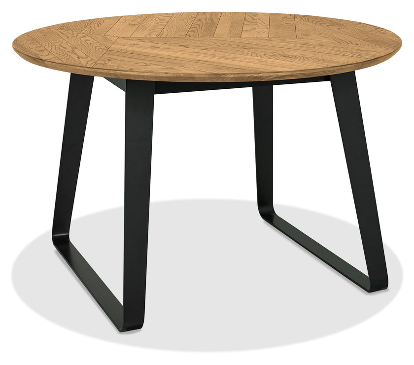 Angled view of the Henderson Round Dining Table.