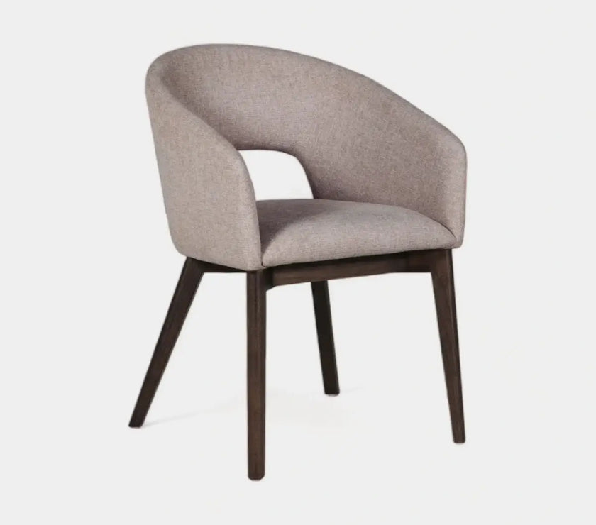 Front and angled view of the Everest Fabric Dining Chairs with plush padding and sturdy legs.