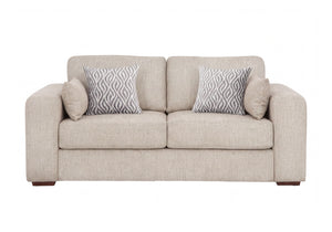 A two-seater fabric sofa in a light beige textured fabric, featuring two patterned throw pillows with a gray and white geometric design and two solid beige accent pillows, shown against a plain white background.