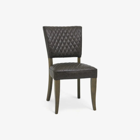 Front and angled image of the Landon Fumed Oak Dining Chairs Saddle Faux Leather with dark oak frame.
