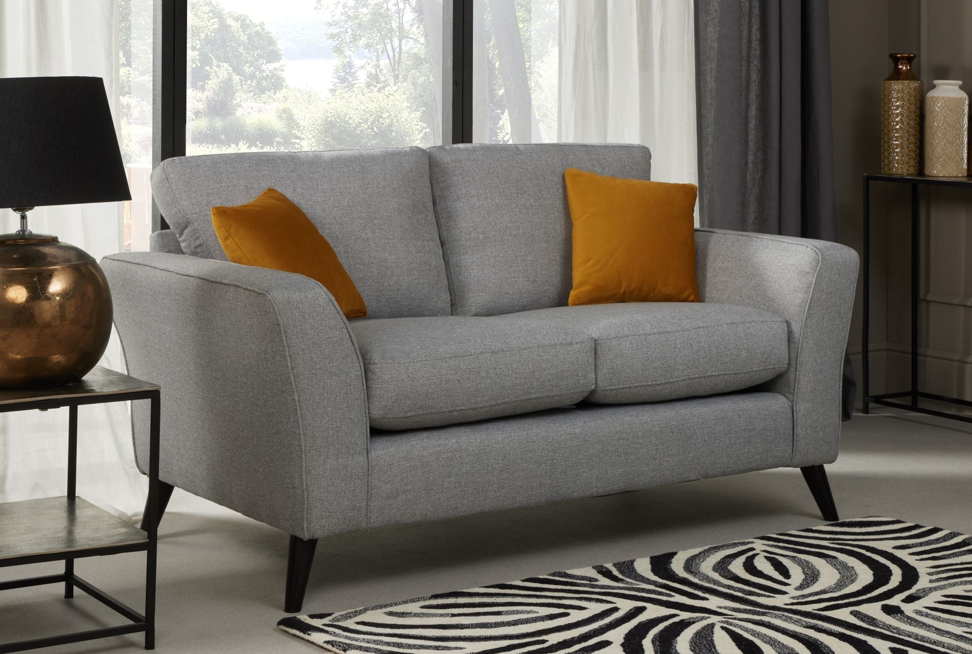 libby 2 seater sofa in silver shown in a room setting 