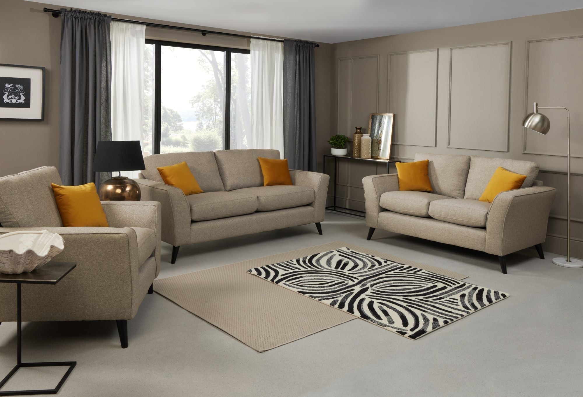 Libby 2 seater, 3 seater and armchair in Oatmeal shown in a room setting 