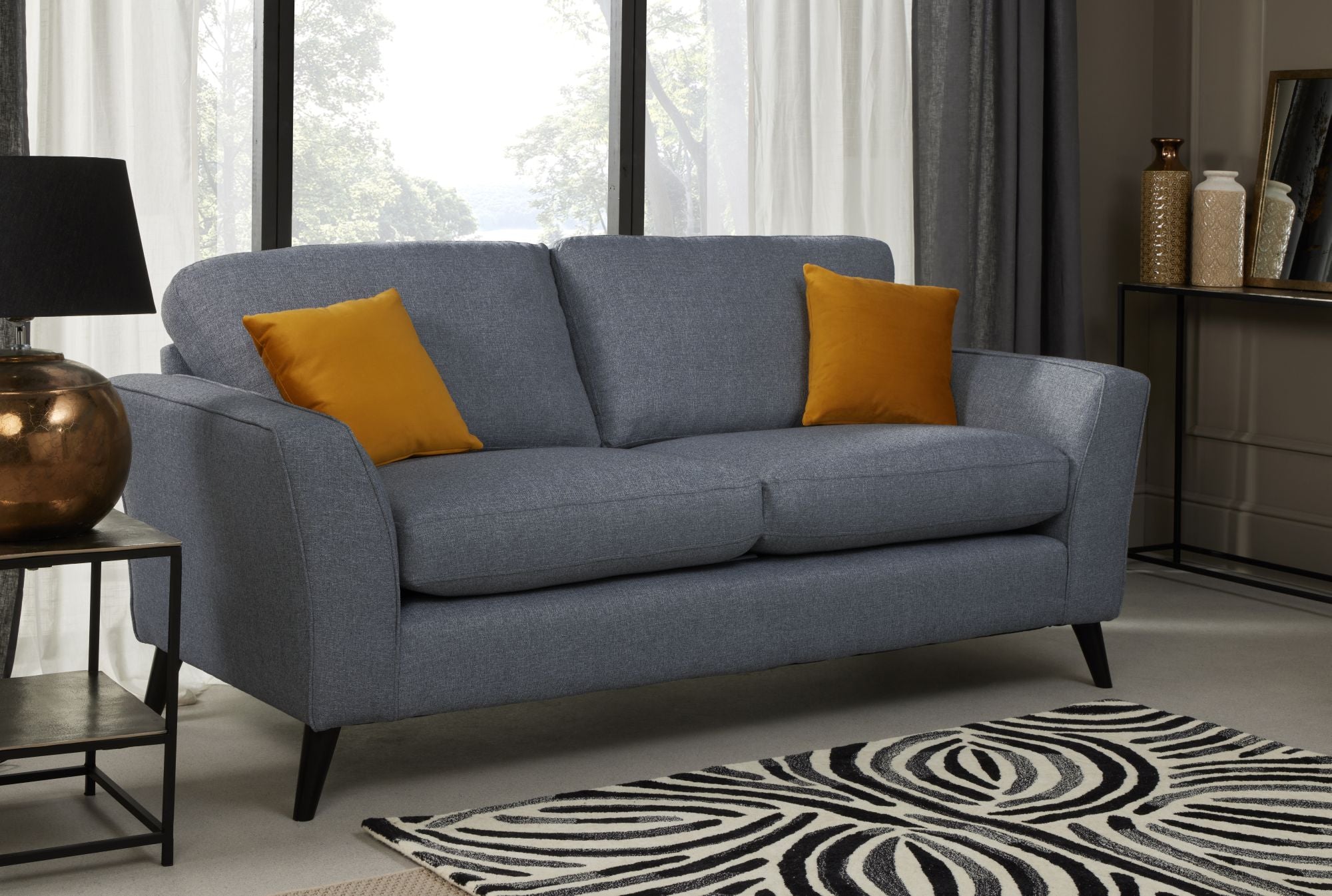 Libby 3 seater in denim shown in a room setting 