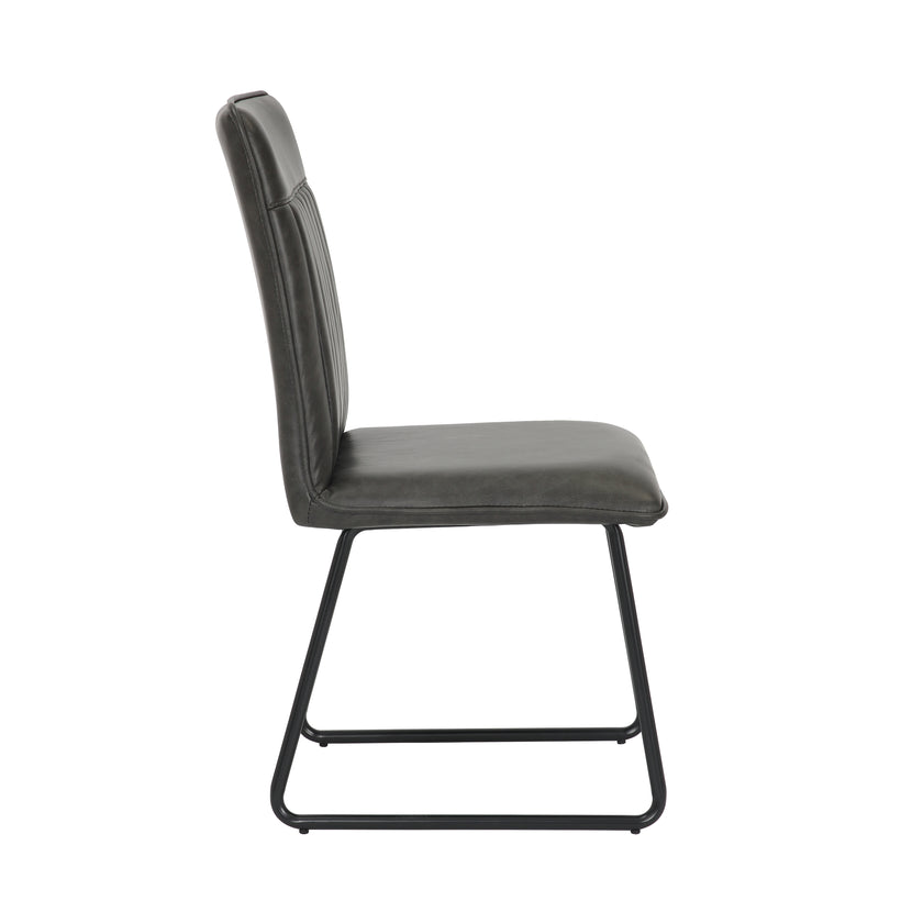 Side Image of the Black Manhattan Faux Leather Dining Chair with black metal legs and high back