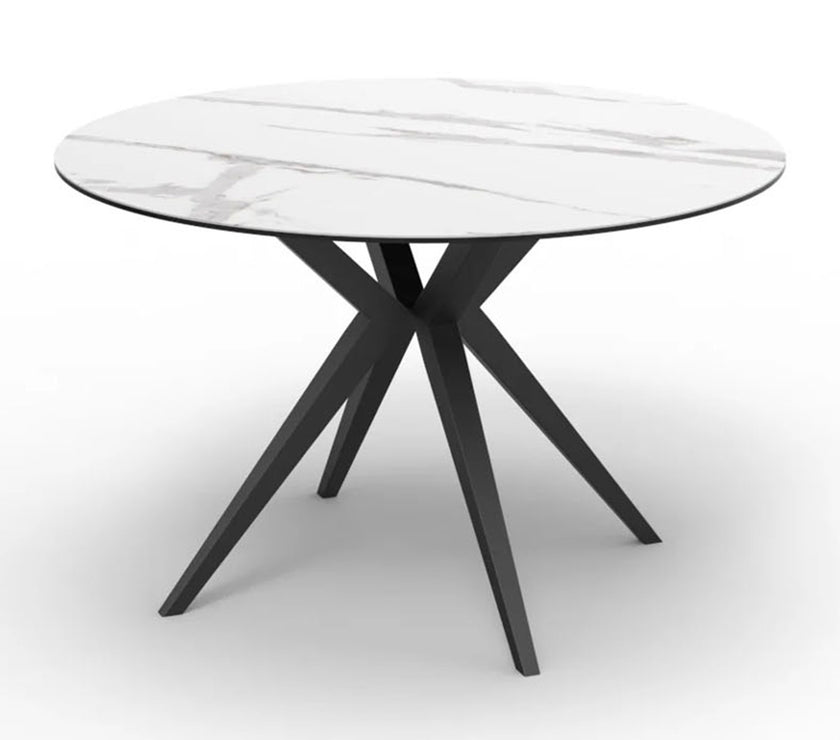 Modern round table with Ceramic top and black metal legs on a white background
