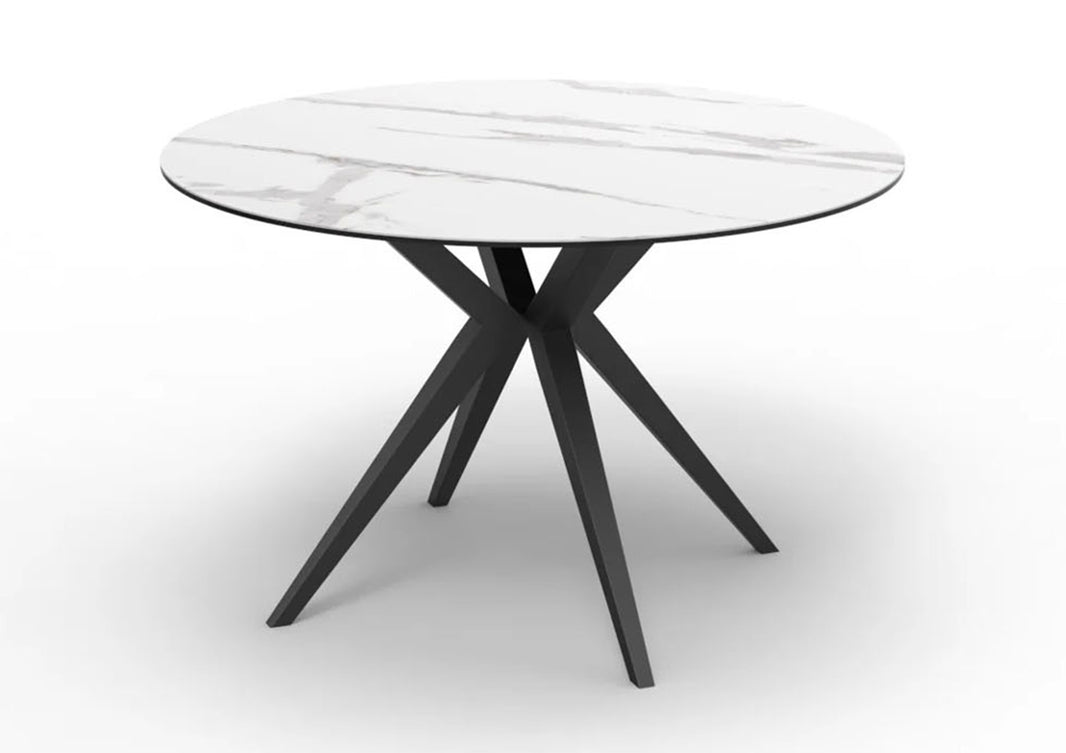 Modern round table with Ceramic top and black metal legs on a white background
