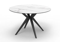 Modern round table with Ceramic top and black metal legs on a white background