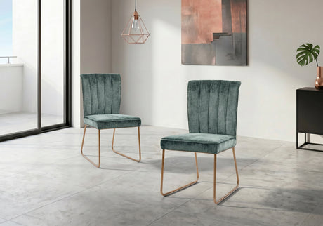 Pair of green velvet chairs in a modern room