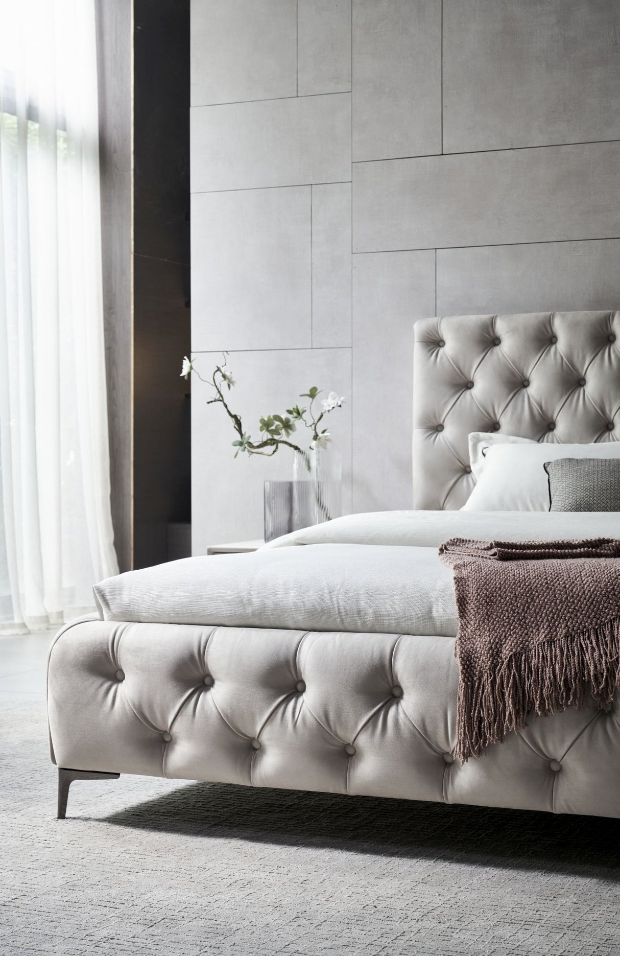 Beige tufted footboard and headboard