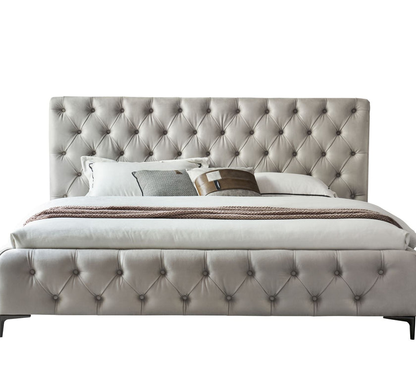 Royal bedframe in Beige nubuk straight on view from the foot end with white background 