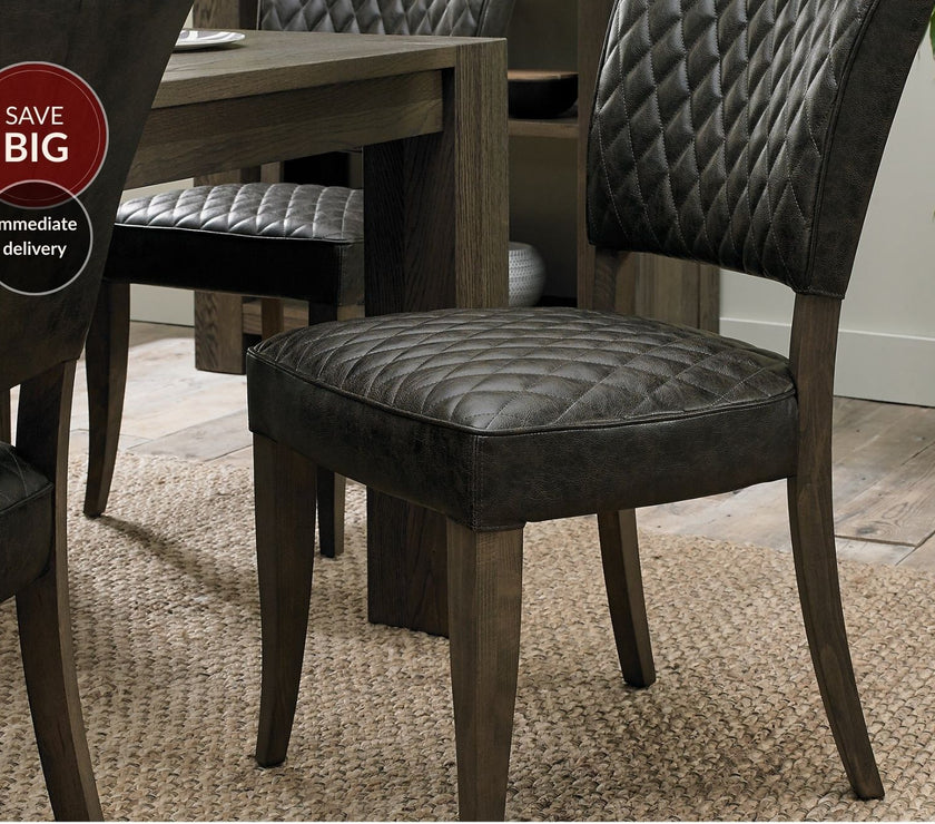 Landon Fumed Oak Dining Chairs Saddle Faux Leather