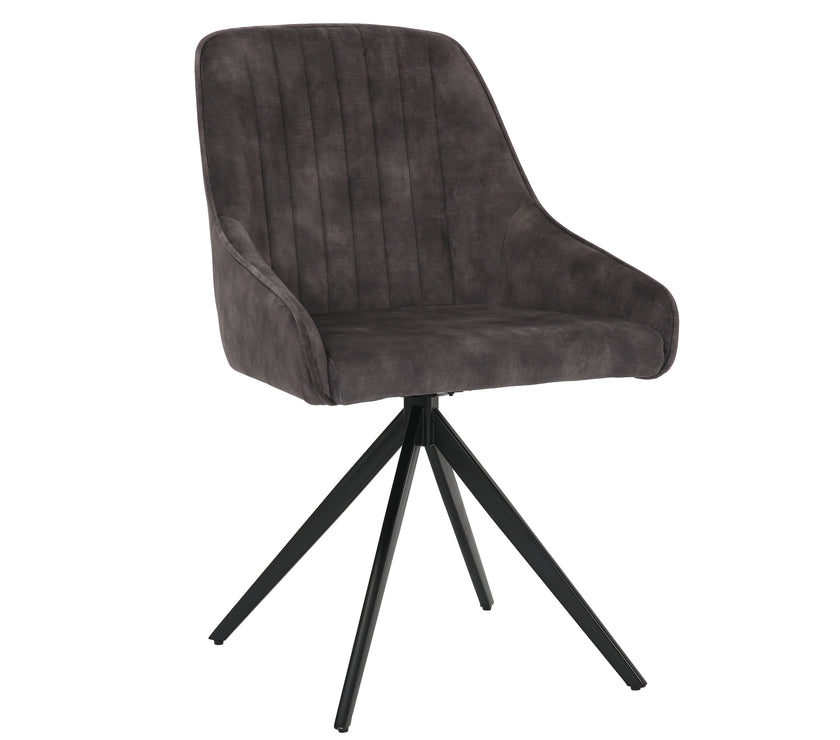 Angled view of the Sofia light grey swivel dining chairs with black metal legs and velvet seat.